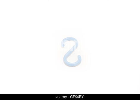 Plastic S shaped hook on white isolated background Stock Photo
