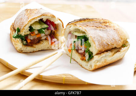 Vietnam style french baguette bread pork bun Banh Mi Stock Photo