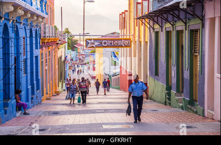 Santiago de Cuba, Cuba on January 5, 2016: Cuban people walking in the pedestrianised city centre of Santiago de Cuba Stock Photo