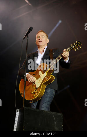 Carfest North, Bolesworth, Cheshire, UK. 31st July 2016. Bryan Adams performing on the main stage and the closing headline act of the 3 day festival. The event is the brainchild of Chris Evans and features 3 days of cars, music and entertainment with profits being donated to the charity Children in Need. Andrew Paterson/Alamy Live News Stock Photo