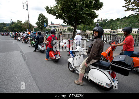 Prague, Czech Republic. 30th July, 2016. Opening of two-day international meeting of owners of Italian Piaggio Vespa scooters started with ride in Prague, Czech Republic, July 30, 2016. © Michal Kamaryt/CTK Photo/Alamy Live News Stock Photo
