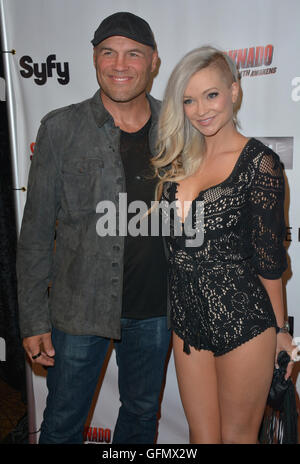 Las Vegas, Nevada, USA. 31st July, 2016. Actress/model Mindy Robinson and UFC fighter Randy Couture attend the ''Sharknado: The 4th Awakens'' movie premiere on July 23, 2016 at the Stratosphere Casino, Hotel & Tower in Las Vegas, Nevada. Credit:  Marcel Thomas/ZUMA Wire/Alamy Live News Stock Photo