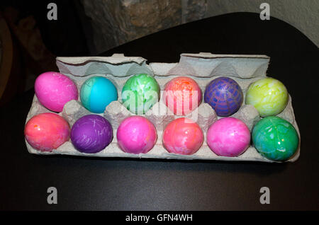 Assortment of pastel decorated colored Easter egg in a 12 pack carton. St Paul Minnesota MN USA Stock Photo