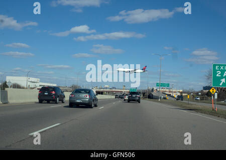 Delta airplane over freeway 494 approaching Minneapolis-St Paul Lindbergh international Airport. Minneapolis Minnesota MN USA Stock Photo