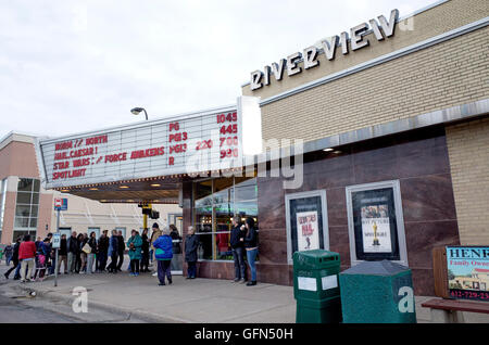 Patrons waiting in line to view the Star Wars movie at the Historic Riverview movie theater. St Paul Minnesota MN USA Stock Photo