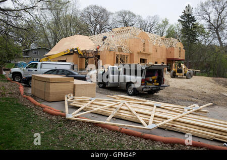 Construction in progress in space of a teardown house April 20, 2016. North Mississippi River Boulevard St Paul Minnesota MN USA Stock Photo