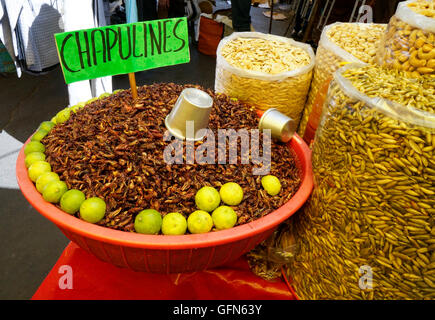 Lagunilla Market in Mexico City, Mexico. Fried grasshoppers and seeds for sale as snacks. Stock Photo