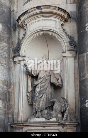 Saint John the Evangelist. Baroque statue on the Dresden Cathedral (Hofkirche) in Dresden, Saxony, Germany. Stock Photo