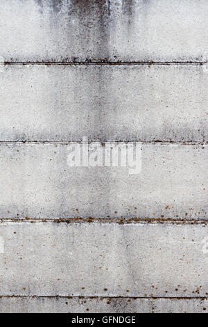 Rain stained concrete wall in full frame Stock Photo