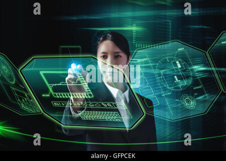 Japanese businesswoman interacting with virtual reality Stock Photo