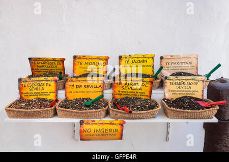 Market stall with baskets full of spanish spices Stock Photo