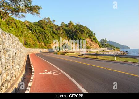 Bike lane in road beside the sea ,Nang Phaya View Point (Chalerm Burapa Chollathit Road),Chanthaburi, Thailand. Stock Photo