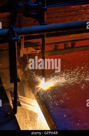 Gas cutting of the hot metal steel plate Stock Photo