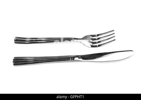 Table knife and fork isolated over white background Stock Photo