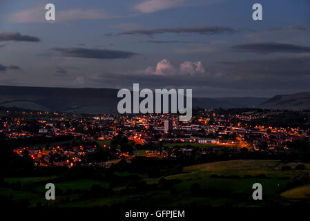 The lights of Hattersley and Mottram in Great Manchester at dusk on a summer evening. Stock Photo
