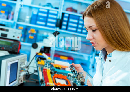 Production of electronic components at high-tech factory Stock Photo