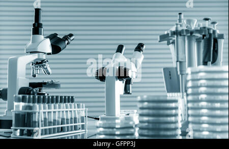 microscope and petri dishes in scientific lab .medical glassware Stock Photo