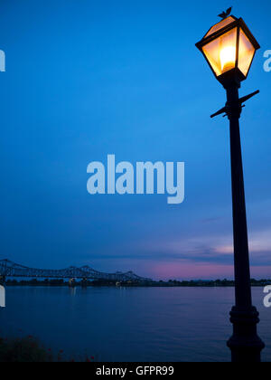 Sunset over the bridge at Natchez under the Hill by the mighty Mississippi River Stock Photo