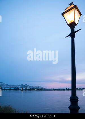 Sunset over the bridge at Natchez under the Hill by the mighty Mississippi River Stock Photo