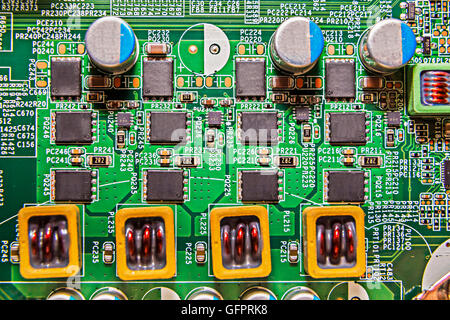 Top down shot of microchips and resistors on a circuit board, could represent the electronics industry Stock Photo