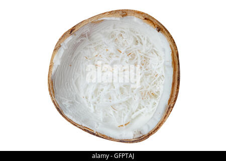 Freshly grated coconut in shell isolated on white background Stock Photo