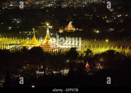 Kuthodaw Pagoda (World's Biggest Book, Stone Library) at the night. Mandalay, Myanmar. Stock Photo