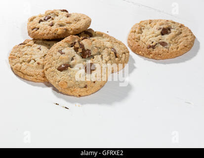 cookies with chocolate chunks on a white wooden table Stock Photo