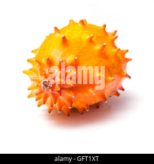 Honed melon or kiwano isolated on a white studio background. Stock Photo