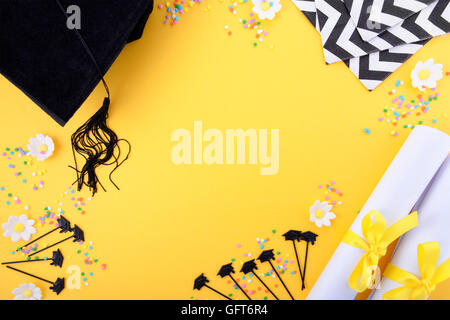 Yellow black and white theme graduation background with decorated borders on yellow background. Stock Photo