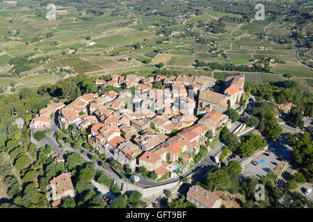AERIAL VIEW. Medieval hilltop village overlooking a landscape of grapevines. Le Castellet, Var, Provence, France. Stock Photo