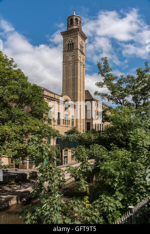 New Mill at Saltaire in West Yorkshire. An NHS establishment beside the river Aire. Stock Photo