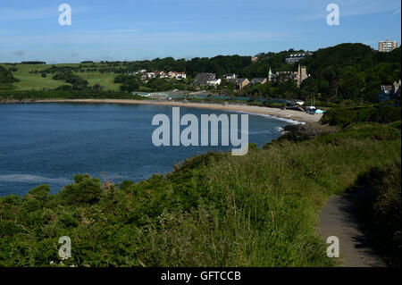 coast path views of sheltered bay and headlands at Langland , Gower, Swansea Stock Photo