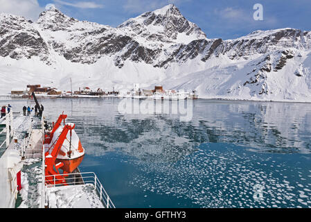 View of the former whalers settlement at Grytviken, South Georgia taken from MV Ushuaia while at anchor in King Edward cove. Stock Photo