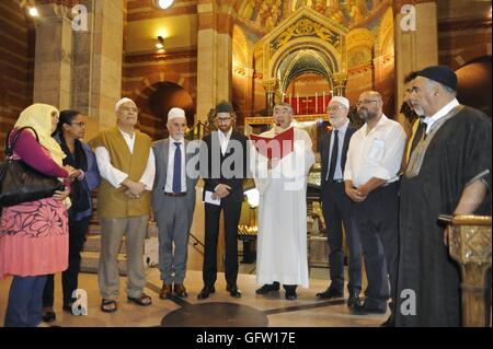 Milan (Italy) 07.31.2016 - Muslim authorities attend Mass in the church of Santa Maria in Caravaggio to show its solidarity with the Catholic world after the killing of the French priest Jacques Hamel Stock Photo