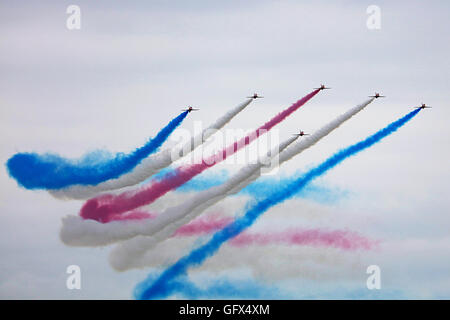 Red Arrows with smoke Stock Photo
