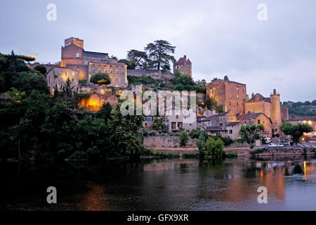 Puy L'Eveque lit up at night on banks of Lot River of South West France Stock Photo