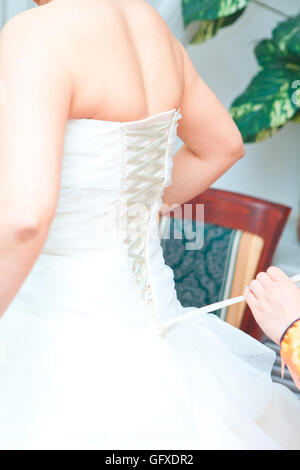 bride dressed in wedding dress, close-up, back, wedding, bride bridesmaid dresses Stock Photo