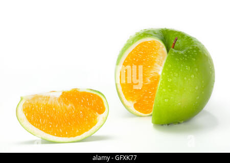 Apple Orange Hybrid. Close-up image of fresh green apple combined with orange. Stock Photo