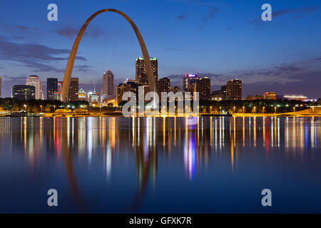 City of St. Louis skyline. Image of St. Louis downtown with Gateway Arch at twilight. Stock Photo