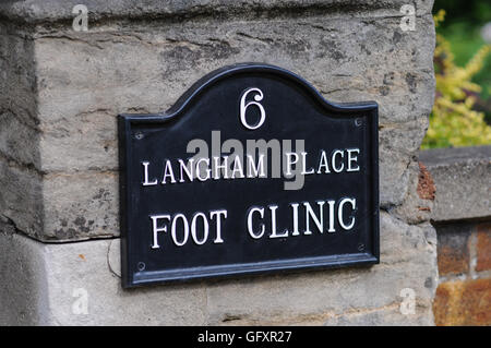 Foot clinic sign business chiropody Stock Photo