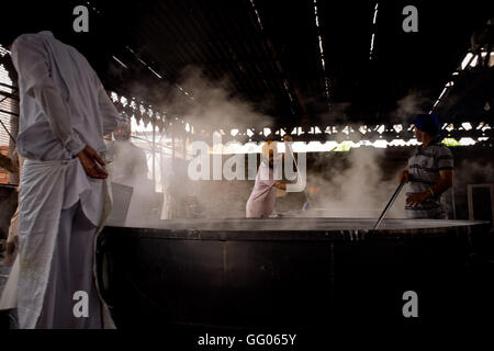 Amritsar, Punjab, India. 12th May, 2013. File Image - Volunteers prepare food for worshippers and pilgrims in the kitchen of the Golden Temple complex in Amritsar, India. The Golden Temple, also known as Harmandir Sahib, is the main destination of pilgrimage for Sikhs. © Jordi Boixareu/ZUMA Wire/Alamy Live News Stock Photo
