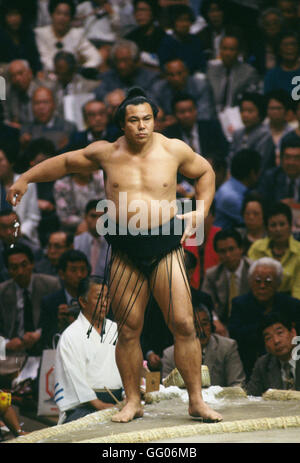 FILE: Former sumo champion Chiyonofuji dies at age 61. The former Yokozuna and 31-time sumo champion died on July 31st, 2016 due to pancreatic cancer. Photo taken MAY 14, 1987 - Sumo : Yokozuna Chiyonofuji throws the salt before the match against Jingaku during the Grand Sumo Championship Summer Series at Ryogoku Kokugikan in Tokyo, Japan. Stock Photo