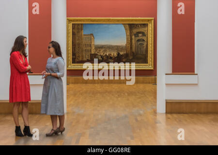 London, UK. 3rd August, 2016. Gallery staff get a preview ofRome, from the Vatican. Raffaelle, Accompanied by La Fornarina, Preparing his Pictures for the Decoration of the Loggia - Works by JMW Turner, which have returned home to the Clore Gallery of the Tate Britain following a major international tour to the USA and Canada. Highlights include: Norham Castle – Sunrise: a much-loved painting from late in Turner’s career, showing an atmospheric vision of the British landscape bathed in sunlight; Peace – Burial at Sea: Credit:  Guy Bell/Alamy Live News Stock Photo