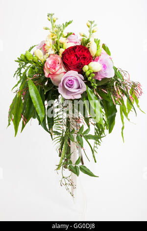 weeping bridal bouquet of Australian flowers, leaves and ferns Stock Photo