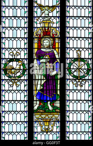 London, England, UK. Church of St Alban the Martyr, Holborn. Stained glass window: St Peter Stock Photo