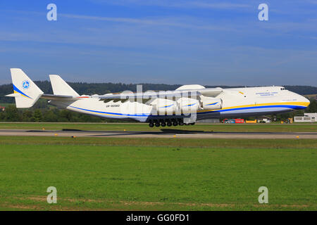 Zurich/Switzerland August 10, 2014: the biggest Airplane Antonov 225 from Antonov Airlines company landing at Zurich Airport. Stock Photo