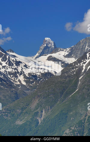 The Matterhorn peeking out, seen from the Europaweg Trail near Zermatt, Switzerland Stock Photo
