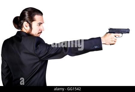 Gangster man in black suit aiming gun Stock Photo