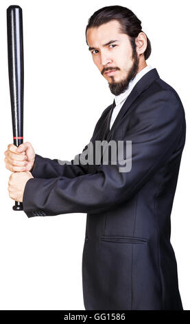 Angry looking businessman with bat Stock Photo