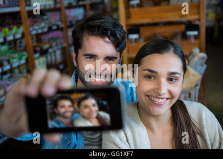 Happy couple taking a selfie Stock Photo